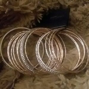 NWT rose and silver tone bangle bracelets